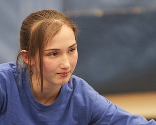William D Lewis the Vindicator Hubbard sophomre wrestler Shirley Flynn warms up before a recent practice. She is one of just a few girl wrestlers in the state.