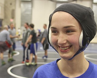 William D Lewis the Vindicator Hubbard sophomore wrestler Shirley Flynn warms up before a recent practice. She is one of just a few girl wrestlers in the state.