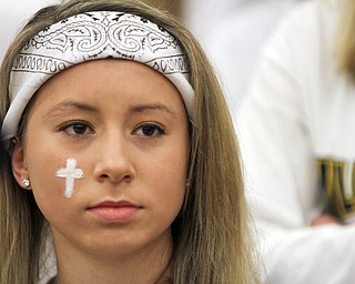 William D. Lewis the Vindicator Wilmingotn HS 11th grader Chelsea Rogel painted a cross on her face to remember classmate killed in traffic accident.
