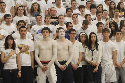 William D. Lewis the Vindicator  Somber faced students at Wilmingotn HS wear white in honor of classmate killed in traffic accident.