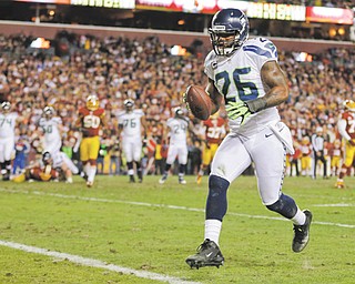 Seattle Seahawks fullback Michael Robinson crosses the goal line for a touchdown during the first half of their NFC wild card playoff game against the Washington Redskins in Landover, Md., on Sunday. The Seahawks won, 24-14.