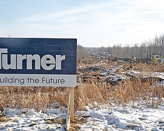 A sign marks land being cleared by Turner Construction Co. for the Austintown racino, slated to be finished in 2014. Though Penn National Gaming Inc., owners of the property, can clear the land, construction is being held up by approval of a transfer of license from the Ohio Racing Commission.