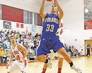Poland’s George Chammas (33) goes to the hoop against LaBrae during their game on Tuesday in Leavittsburg.
