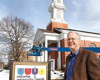 Matt Alspaugh, minister with the leaning steeple..The First Unitarian Universalist Church of Youngstown, on elm has decided to remove its steeple, which has fallen into disrepair, and store it at CASTLO Industrial Park pending possible restoration or replacement.