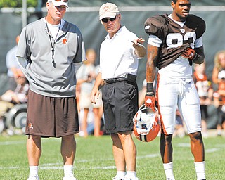 Former Ohio State head football coach Jim Tressel talks with then Cleveland Browns coach Pat Shurmur during training camp. At this point, Tressel’s name has not officially come up as a candidate to replace the fired Shurmer.