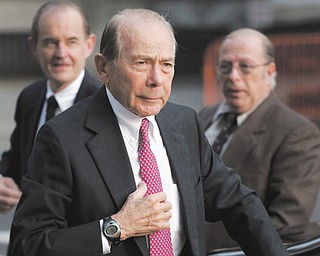 Maurice Greenberg, former CEO of AIG, arrives for a meeting of the insurance company’s board of directors Wednesday in New York. AIG decided Wednesday not to join a lawsuit against the government that spent $182 billion to save it from collapse.