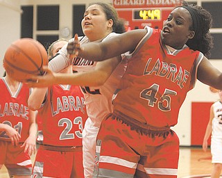 Bree Bishop (32) of Girard goes to the hoop against LaBrae’s Ashlee Stubbs (45) during their basketball game Thursday in Girard. The Indians downed the Vikings, 52-34, with Bishop scoring a game-high 16 points and grabbing 16 of the team’s 31 rebounds.