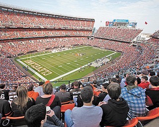 Fans watch the action in Cleveland Browns Stadium during a game between the Cleveland Browns and the Seattle Seahawks on Oct. 23, 2011.