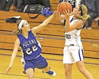 Lakeview’s Abby Pavlik (3) looks to pass as Poland’s Marissa Trevis (22) defends during the first half of a game Monday night. Lakeview used full-court pressure to pull away from a first-quarter tie for a 45-29 victory.