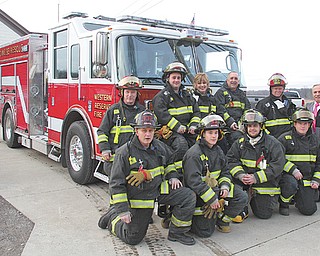 Western Reserve Fire District personnel pose with the department’s new $414,000 fire engine. The Saber model engine from Pierce Manufacturing was ordered in April and arrived Dec. 29. It replaced a 1983 engine that was worn down and did not meet current safety standards. Firefighters have transferred equipment to the new truck and undergone training on how to use it.