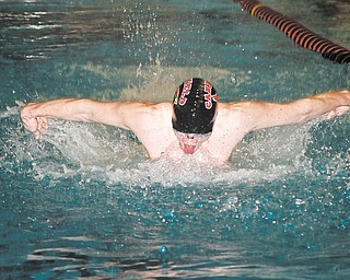 Canfield sophomore Connor Brady competes Wednesday in the 200-meter butterfly relay during a swim meet against Alliance at the YSU natatorium. The boys remain undefeated, with Brady poised to make a return to state competition.
