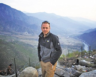 John Wendle, a Youngstown native, has covered the war in Afghanistan as a journalist.