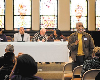 The Rev. Lawrence C. Underwood of Youngstown speaks to participants at the 30th annual Rev. Dr. Martin Luther King Jr. Community Workshop, which was Monday at First Presbyterian Church in Youngstown.