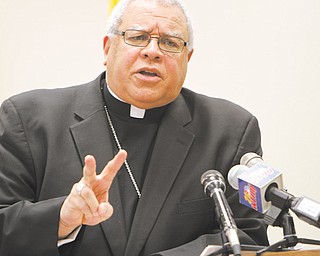 Bishop George V. Murry of the Catholic Diocese of Youngstown had a Thursday news conference to address
reports that 11 men settled out of court as a result of sexual abuse at Warren JFK High School.