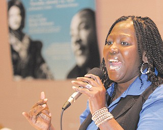 Linda Crosby, a peer mentor at YSU’s Center for Student Progress, performs during the breakfast.