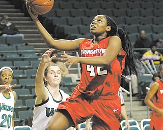 Youngstown State’s Brandi Brown (42) goes for the layup against Cleveland State’s Haley Schmitt (40) during the first half of Thursday’s game at the Wolstein Center in Cleveland. The Penguins bested the Vikings 72-63 with help from Brown, who matched her season high with 28 points and added 17 rebounds.