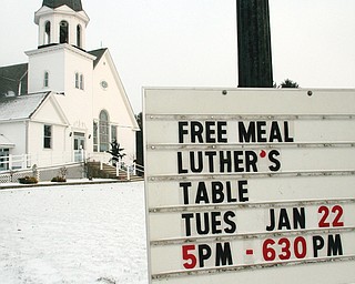 The sign at Zion Lutheran Church in New Middletown advertises the January meal; future meals, which are open to all, are planned the fourth Tuesday of the month.
