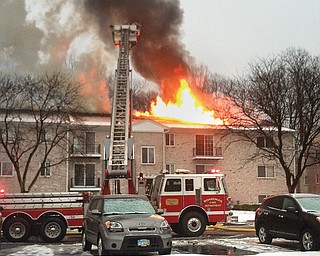 Fire crews from Boardman, Austintown and Canfield battle an apartment blaze that broke out about 8:30 a.m.
Monday at 6849 Lockwood Blvd. in Boardman. A woman was taken to the hospital, where she later died.