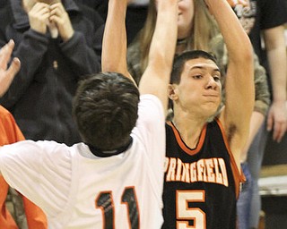 William d Lewis the Vindicatore Springfield's Jake Ohlin(5) passes around Ridge's Zac Hagy(11) during 1 rst half action Tuesday at Ridge.