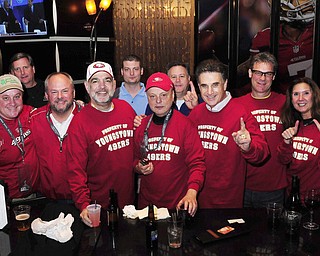 2/2/13 New Orleans LA.-NFL Youngstown Businessman Bruce Zoldan meets a group from Youngstown Ohio in the San Franciso 49er's hotel lobby bar and passes out special Youngstown Ohio SF49er's Tshirts. Included in the group is Greg Strollo, Mike Bruno,Jeff Chrystal, and Sue and Ron Yarab all from Youngstown. Photo©Suzi Altman