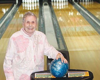 Jean Guarnieri, of Liberty, a senior league bowler at Holiday Bowl in Struthers, rolled a 100 on Wednesday, which was her 100th birthday. A plaque, cake and cards also marked the occasion.