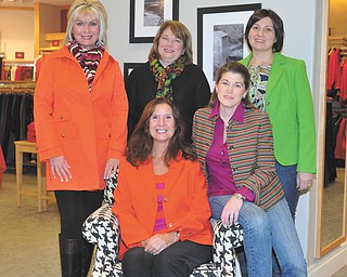 Preparing for the Mahoning County Medical Society Alliance’sa ninth annual Champagne Brunch and Fashion Show on Feb. 22 at Avion on the Water in Canfield, are, standing from left, Shelley Duffett, president of the alliance; Carol Sankovic, president of the Ohio State Medical Association; and Tammy Engle, co-chairwoman of the event and treasurer of the alliance. Sitting are Susan Yarab, event committee member, and Cassi Calderon, co-chairwoman of the event. Photo by Lindsay McCall | The Vindicator