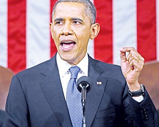 President Barack Obama gestures as he gives his State of the Union address Tuesday.