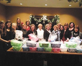 Austintown Junior Women’s League chose the Touched by Nathan Foundation for its holiday giving this year. Members donated items to fill 25 comfort care baskets for parents of fragile babies during their stay at Akron Children’s Hospital at the Beeghly Campus special-care nursery and the St. Elizabeth Neonatal Intensive Care Unit. The league is a volunteer nonprofit group of women founded in 1994 for the purpose of having a creative outlet for women interested in giving community service in areas of art, conservation, education, home life, international affairs and public affairs. For information on the Touched by Nathan Foundation visit touchedbynathan.org. For information on the Austintown Junior Women’s League email or mail Theresa Lyden, president at tllmt@yahoo.com or P.O. Box 4882, Austintown, OH 44515.