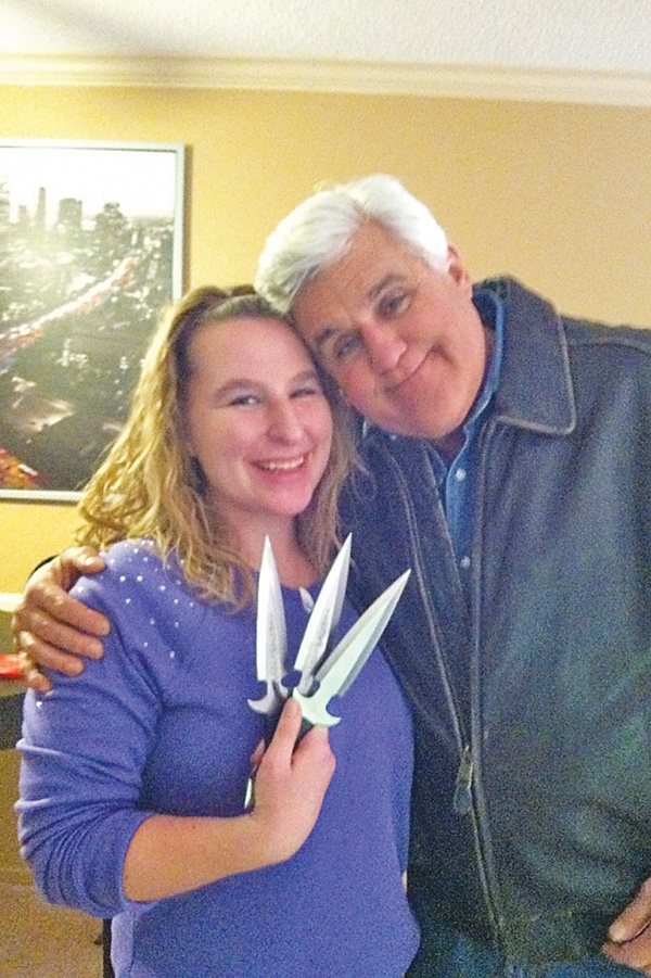 Amber Bohac gets a hug from Jay Leno. Bohac got a visit from the talk-show host and demonstrated her knife-throwing skills for him.