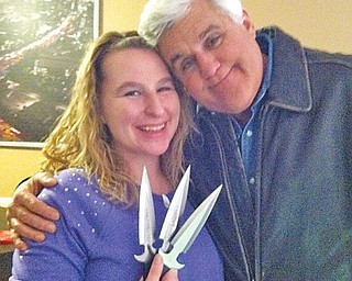 Amber Bohac gets a hug from Jay Leno. Bohac got a visit from the talk-show host and demonstrated her knife-throwing skills for him.