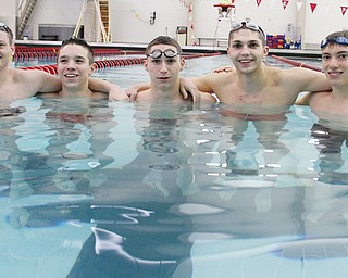 Canfield swimmers, from left, Connor Brady, Mike Cardone, Nicky Montalto, Daniel Bogen and Michael DiDomenico pause for a moment during practice at the Youngstown State University pool. The five enter this weekend’s state swimming meet with a hopes of top-five finishes.