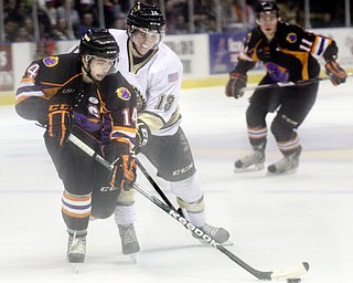 William D Lewis The Vindicator Phantoms Alexander Dahl(14) and Lumberjacks Cullen Hurley(18) during 2-23-13 game S