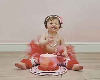 Pretty in pink, red and pearls is Skylar Sheridan of Austintown, who is celebrating her first birthday here. Photo sent in by Allison McClain.