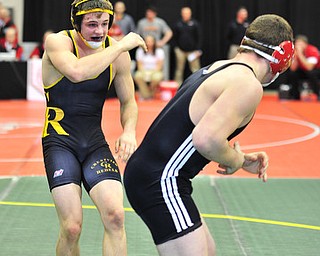 Crestview's Matt Hardenbrook shakes off Mohawk's Grant Price after a clinch during their 170lb bout.