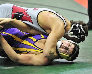 Canfield's John Poullas attempts to pin Eaton's Tyler Claybaker.