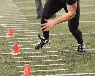 A group of 12 NFL scouts watched five Youngstown State University football players go through various drills Tuesday during YSU’s NFL Pro Day at the WATTS on Tuesday.