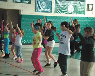 SPECIAL TO THE VINDICATOR
Cold and snow is not stopping the students from moving at St. Patrick School in Hubbard. A group of students is shown participating in Zumbatonic, which the school offers every Wednesday after class. Tina Sims, certified Zumba instructor, leads the 45-minute session that is open to all students and families. The school nurse also has begun a Lunch Laps program that encourages students to walk and keep track of their progress. There also is a roller skating program for gym class two times weekly for a six-week program.