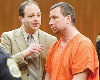 Atty. Louis DeFabio, left, appears in court with Zaryl G. Bush in January. Bush pleaded not guilty Wednesday to several charges, including a murder charge in the death of 14-year-old Teddy Foltz.