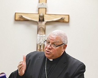 Bishop George V. Murry of the Diocese of Youngstown offers his thoughts on Pope Francis I, the new leader
of the Catholic Church, during a press conference Wednesday afternoon.