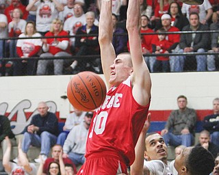 LaBrae’s Peyton Aldridge (10) dunks during the Vikings’ 75-52 win over the Oberlin Phoenix in the Division III regional semifinal Wednesday at Canton Memorial Fieldhouse.