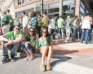 Steve Procopio, Kacy McCormick and Alexandria Hatosky of Warren enjoyed an unusually hot St. Patrick’s Day
in downtown Youngstown last year.