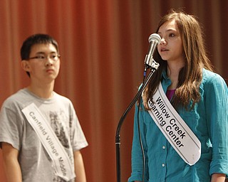 ROBERT  K.  YOSAY  | THE VINDICATOR --..Final Word -  as  Tamsin Day Willow Creek Elementary 8th grader misses the word as Max Lee Canfield Middle School --looks on..The 80th  Youngstown Vindicator Spelling Bee was held at Kilcawley Center on YSU Campus  Saturday morning with  60 competitors from area schools.. ..(AP Photo/The Vindicator, Robert K. Yosay)