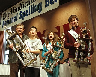ROBERT  K.  YOSAY  | THE VINDICATOR --..Top  Three ---  Dr Fred Ownes  - Max Lee  Tamsin Day  and  Aaron Coares - The 80th  Youngstown Vindicator Spelling Bee was held at Kilcawley Center on YSU Campus  Saturday morning with  60 competitors from area schools.. ..(AP Photo/The Vindicator, Robert K. Yosay)
