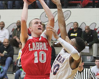 Today’s Division III state semifinal high school basketball game in Columbus is slated to be the battle between two big men with college futures: LaBrae’s 6-foot-7 Peyton Aldridge (10), above, and Versailles’ 6-foot-5 Kyle Ahrens.
