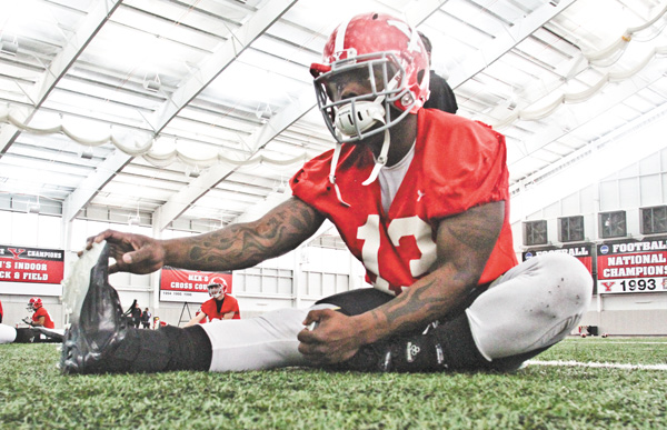 Youngstown State running back Adaris Bellamy works out at Tuesday’s football practice at the WATTS. Since last season the former hotshot recruit from South Florida has undergone a host of changes including becoming a pescetarian, losing weight and gaining perspective, all in an attempt to shed his past baggage in the same way
he shed his knee brace.