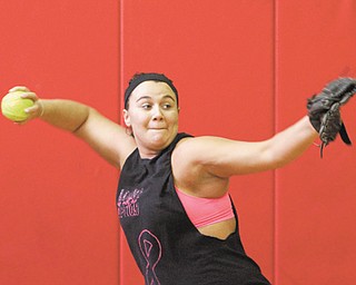 Mathews’ Jacki Rhine makes a throw during practice Monday. Mustangs coach Jim Nicula returns most of the players from last season’s Division IV state runner-up team. The Mustangs were one of three area teams to qualify for the state tournament in 2012.