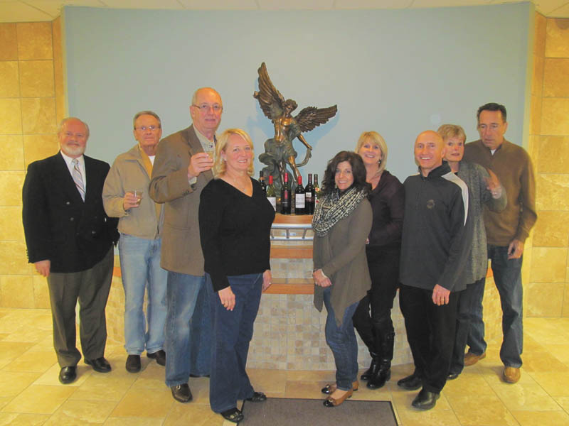 St. Michael Church sets benefit wine taste
Members of St. Michael Church Wine Taste Committee pose in front of the statue of the church’s patron saint as they prepare for the seventh annual St. Michael Church Family Life Center Benefit Wine Taste. Among  committee members are, from left, Chuck Wirtz, Mike Fagan, Jim and Maxine Gordon, Michelle Billy, Sharon Fischer, Mark Billy and Audrey and Mike Geskey. The event will take place at 7 p.m. April 19 in the Family Life Center, 300 N. Broad St., Canfield. Proceeds will help pay for the center’s mortgage. Tickets are $50 per person and are available from committee members or by calling the church office at 330-533-6839. Wines from northeast Ohio will be paired with food by The Embassy and parishioners Mike and Karen Naffah. There will be auction items and a raffle drawing. SPECIAL TO THE VINDICATOR