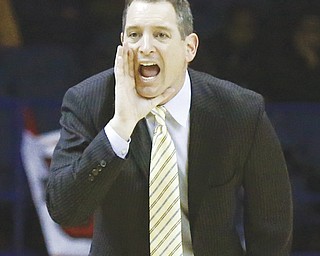 Rutgers head coach and Boardman native Mike Rice has come under scrutiny after a video showing him
physically and verbally abusing his players was released online.