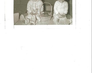 This photo, taken in 1963, is of Linda Fridley of Niles, left, and Sandra Mitchell of Ellsworth. It was sent in by their mother, Betty Jones. And yes, that's a live bunny in the basket — it was their gift from the Easter Bunny!