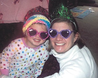 Aaliyah Considine and her mom, Emily Considine, practice being princesses. They live in Columbus. Photo sent in by Grandmother Chris Considine of Poland.